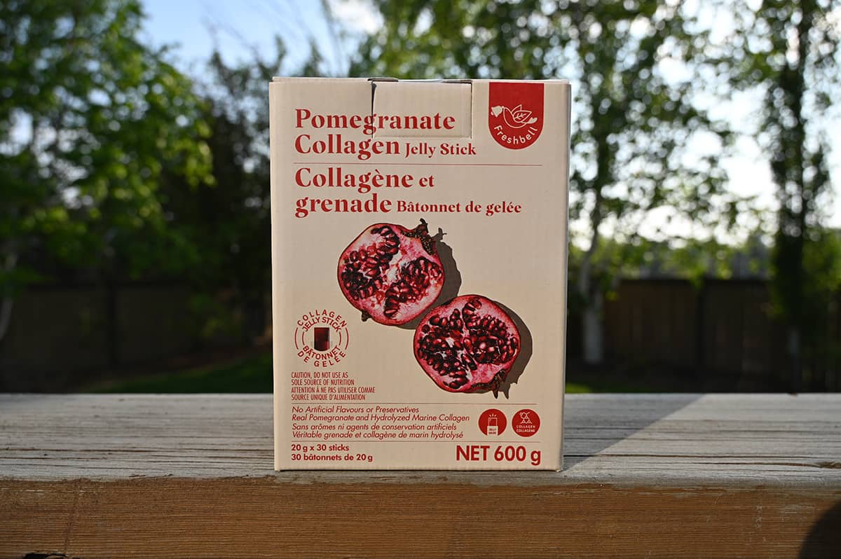 Costco Freshbell Pomegranate Collagen Jelly Stick box sitting outside on a deck.