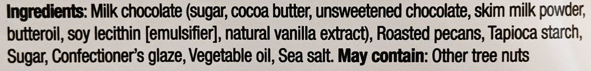 Image of the ingredients list for the milk chocolate pecans.