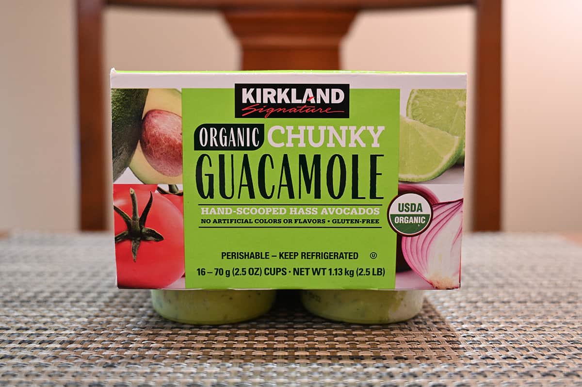 Image of the Costco Kirkland Signature Organic Chunky Guacamole Box sitting on a table. 