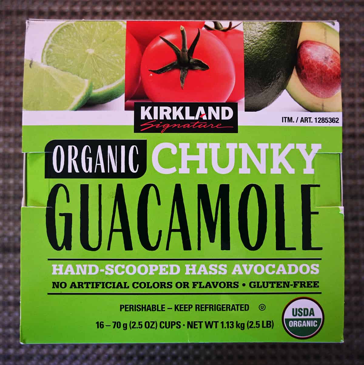 Closeup image of the front of the box of guacamole cops showing that there are no artificial flavors, colors and it's gluten-free.
