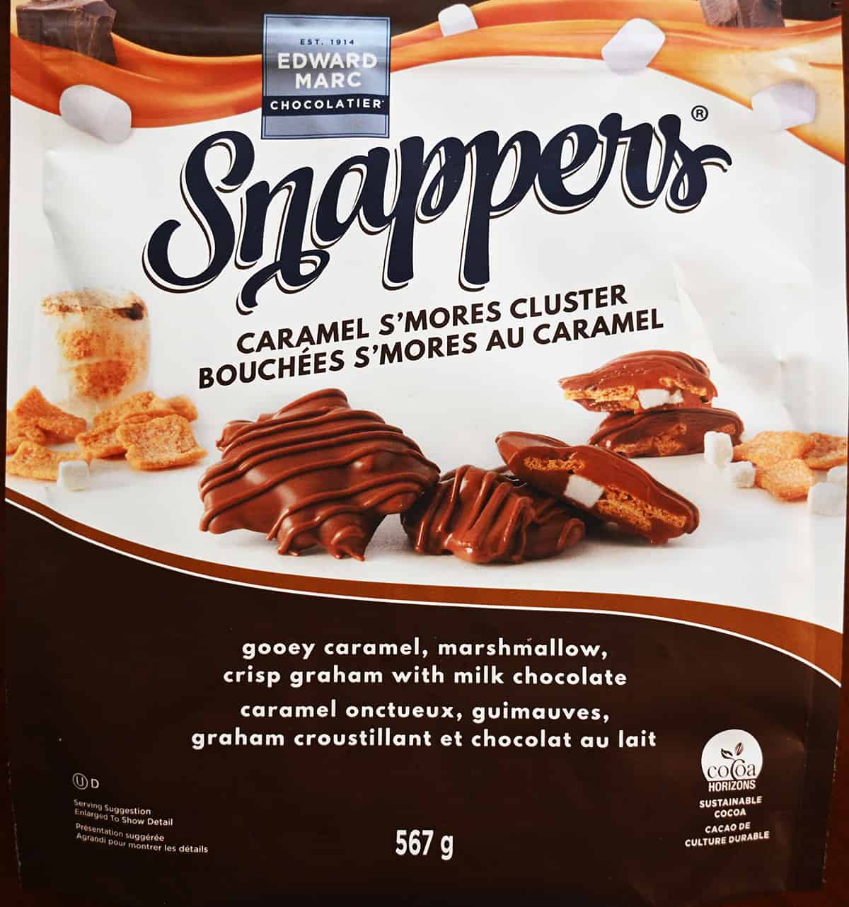 Closeup image of the front of the caramel s'mores Snappers bag.