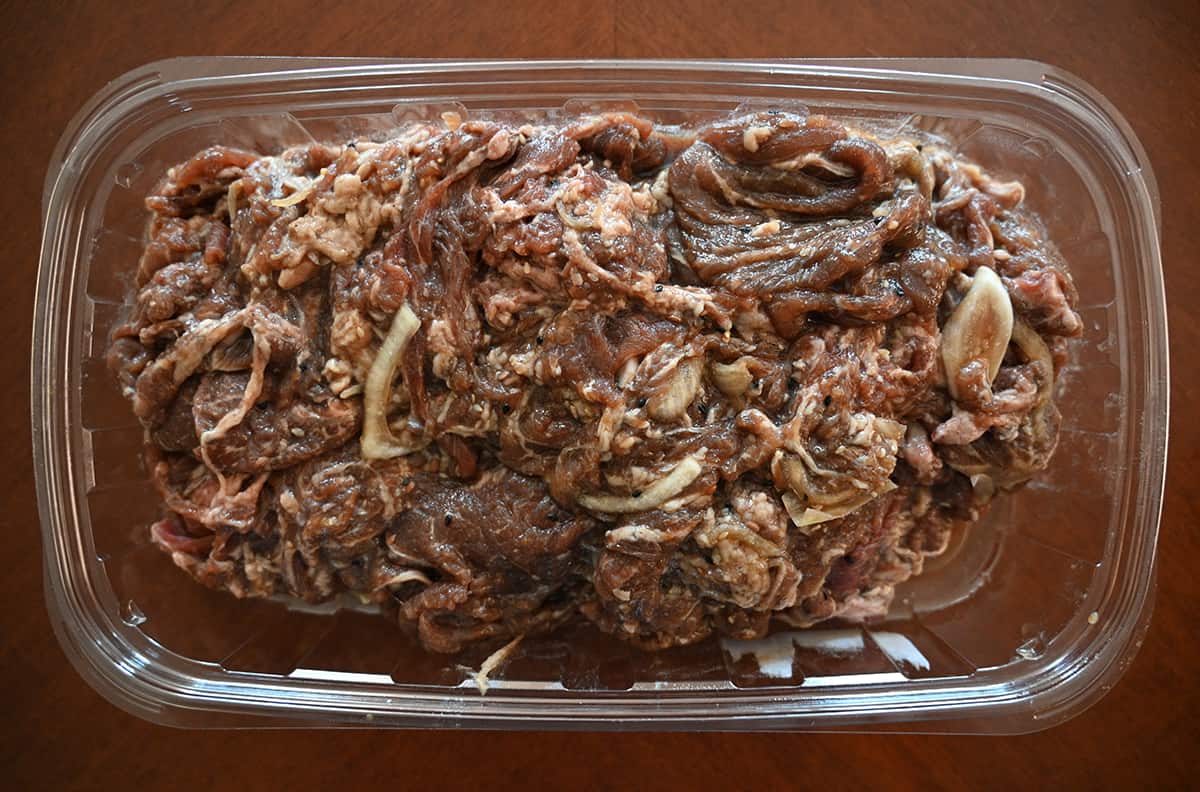 Top down image of the beef bulgogi package with the lid off prior to cooking.