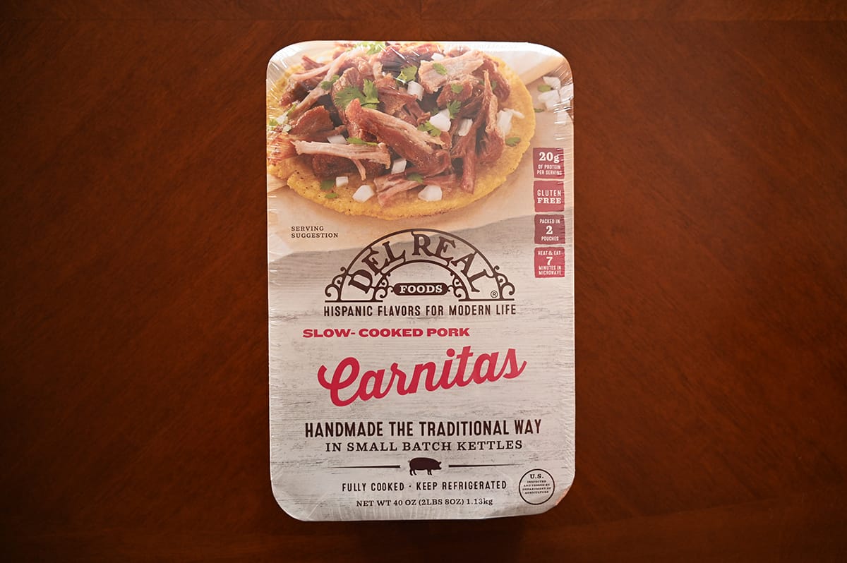 Image of the Costco Del Real Foods Pork Carnitas package unopened sitting on a table.