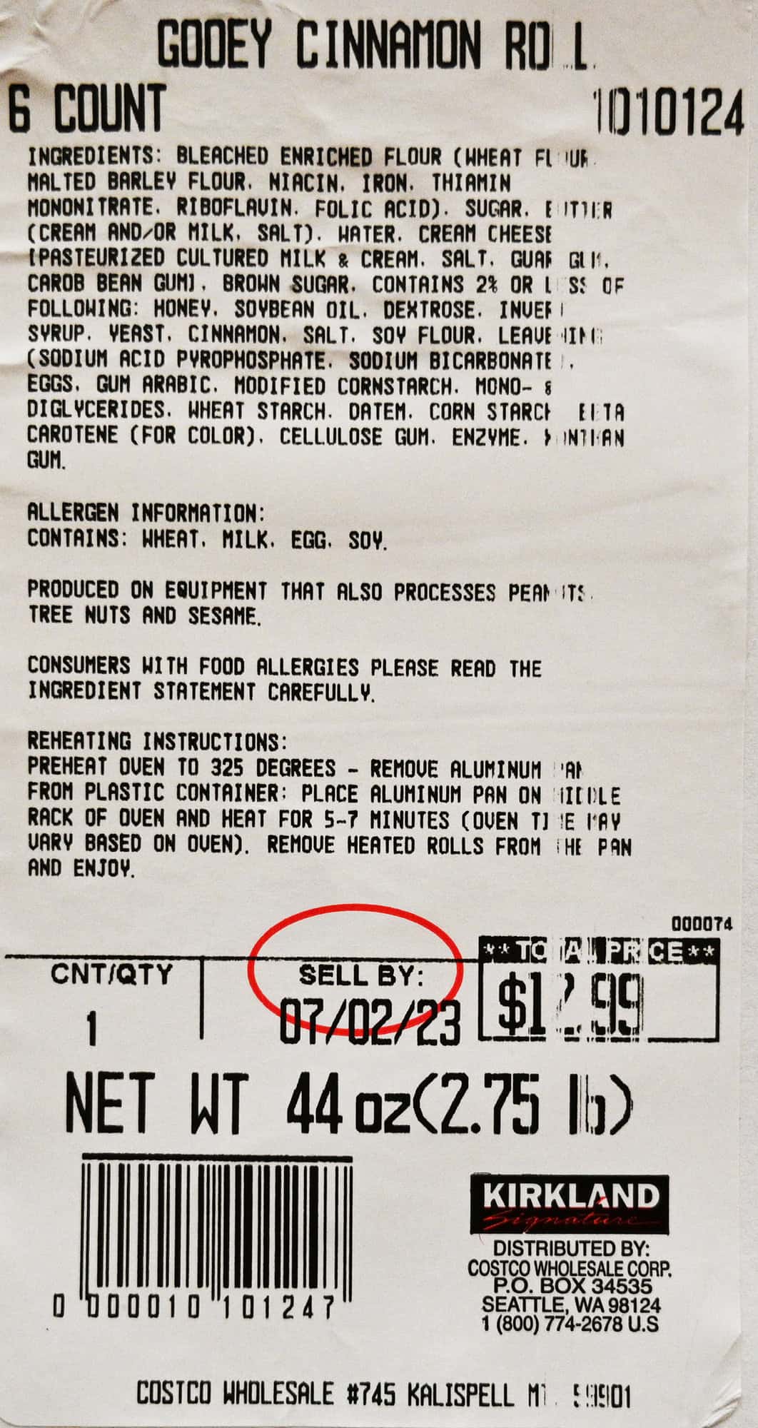 Closeup image of the front label on the cinnamol rolls showing ingredients, allergens and heating instructions along with product number.