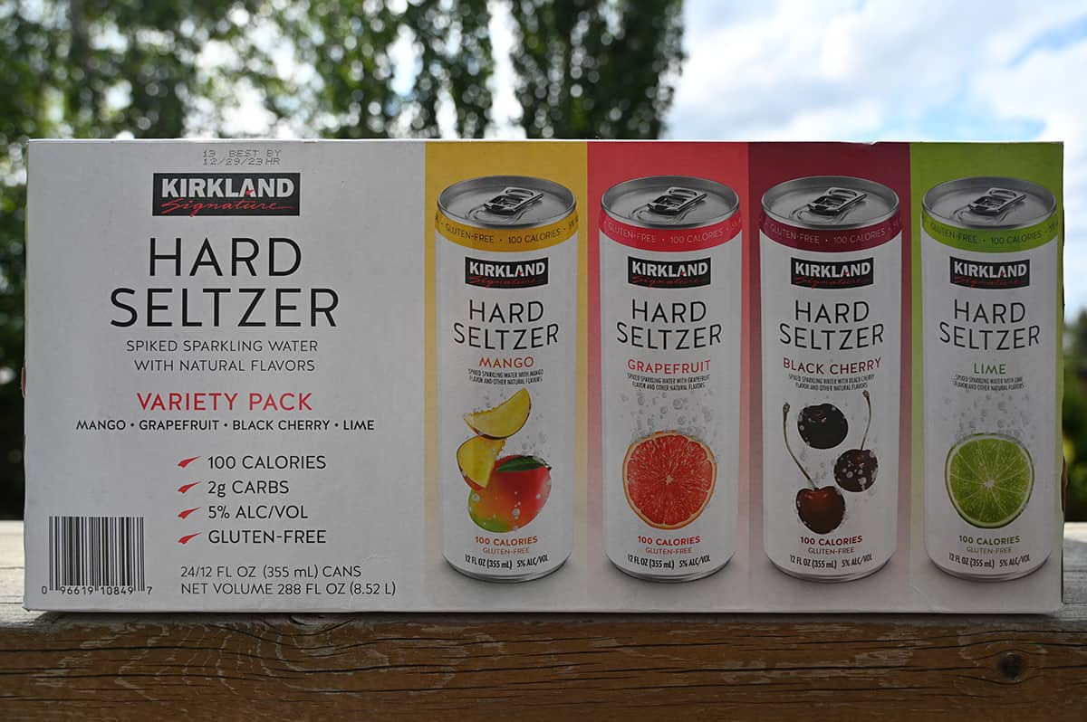 Image of the back of the box of hard seltzer showing the different flavors, 100 calories and two grams of carbs.