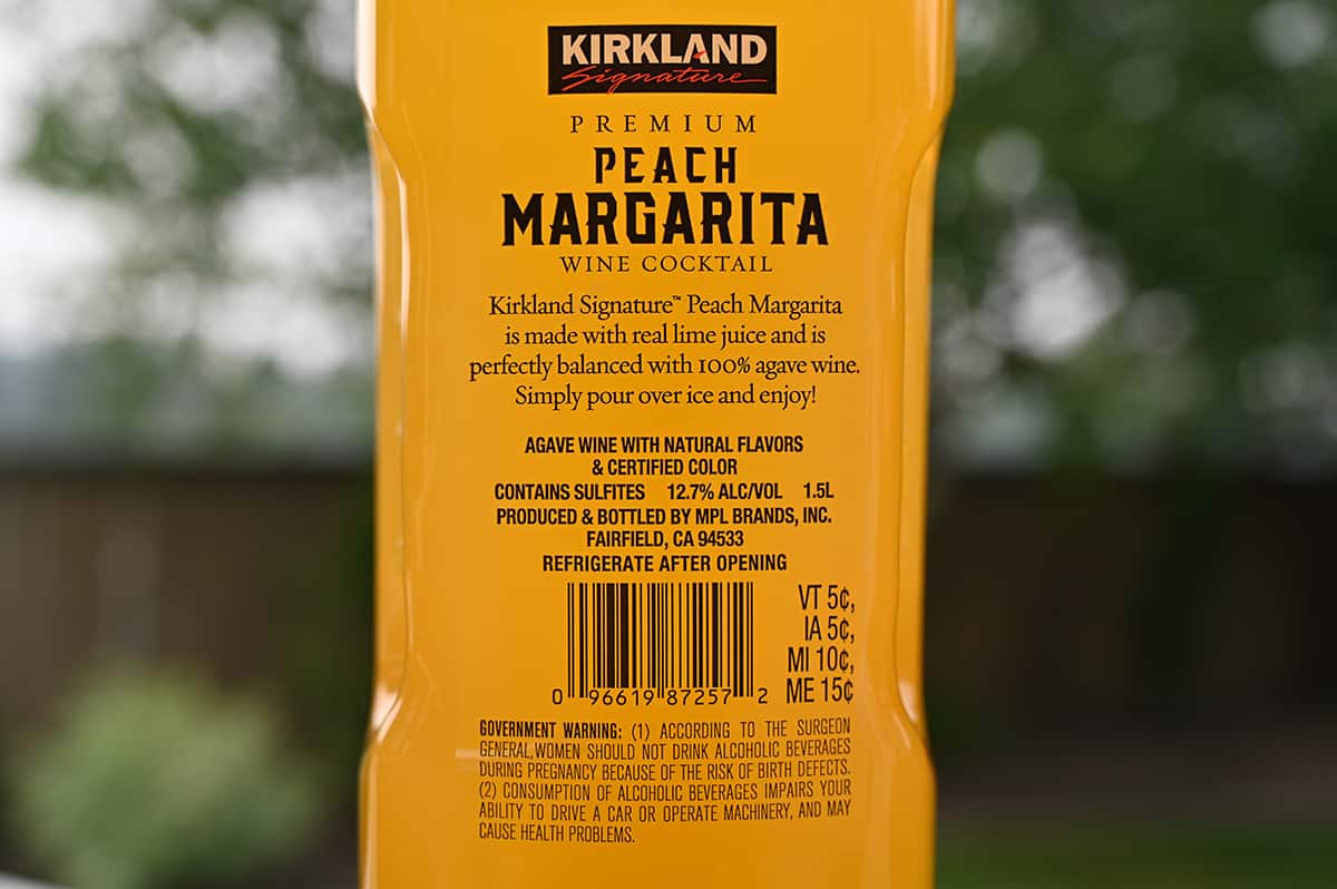 Image of the back of the peach margarita wine cocktail bottle showing the alcohol percentage and ingredients.