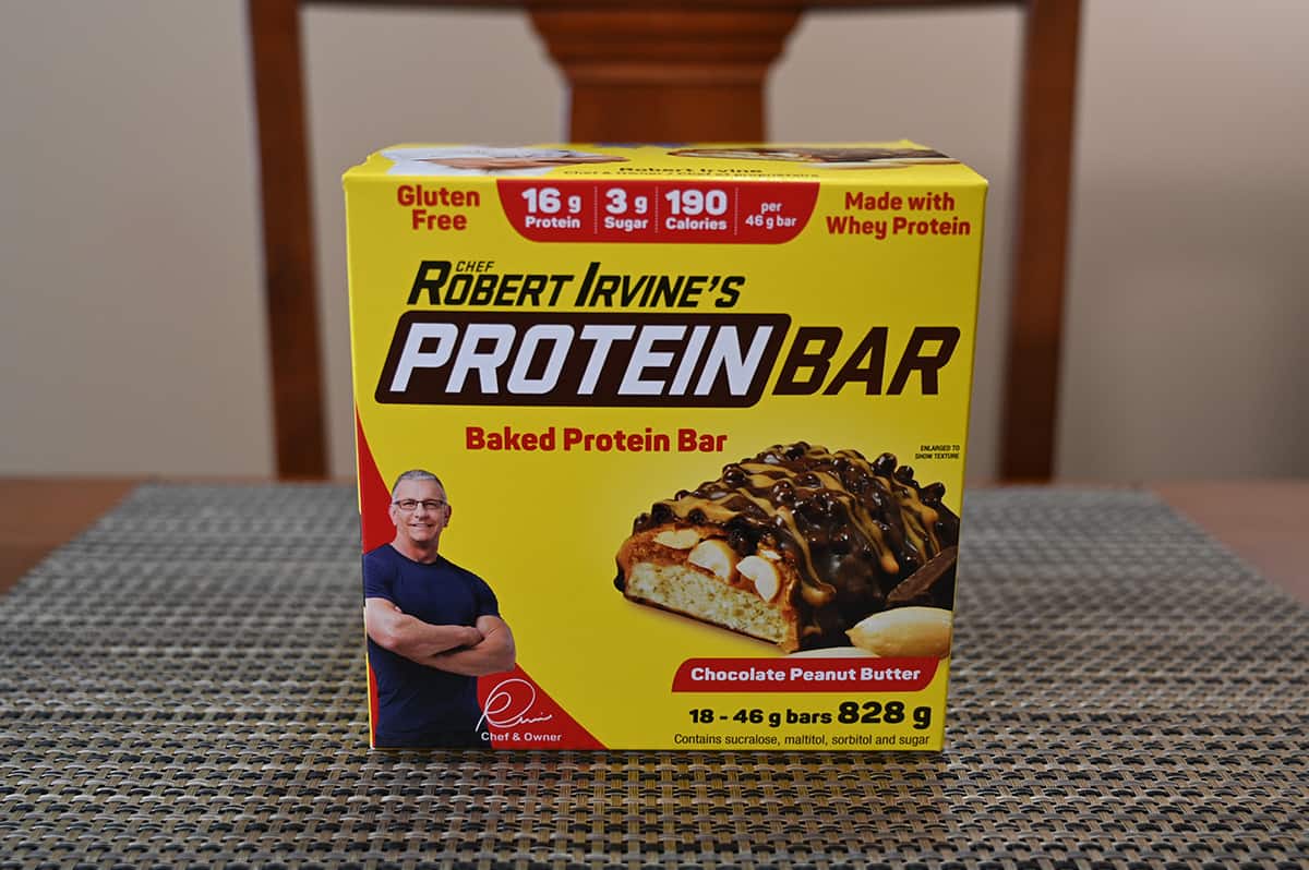 Image of the Costco Robert Irvine's Protein Bars box sitting on a table.