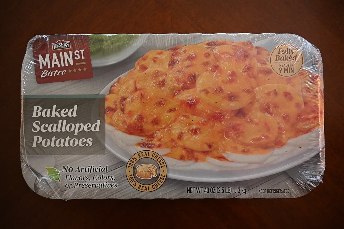 Top down image of the Costco Reser's Main St. Bistro Baked Scalloped Potatoes package sitting on a table unopened.