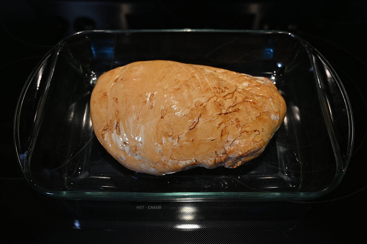 Top down image of the turkey breast sitting in a shallow pan ready to go in the oven, this is prior to heating it.