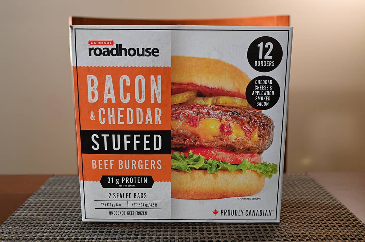 Costco Cardinal Roadhouse Bacon & Cheddar Stuffed Beef Burgers box sitting on a table unopened.