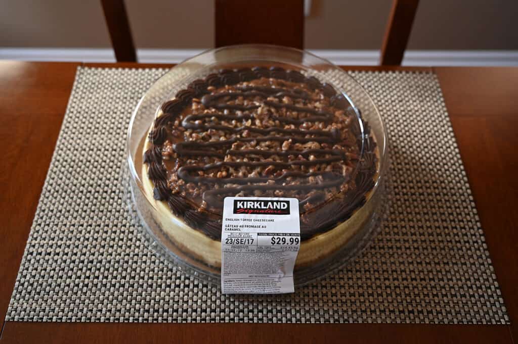 Image of the Costco Kirkland Signature English Toffee Cheesecake unopened sitting on a table.
