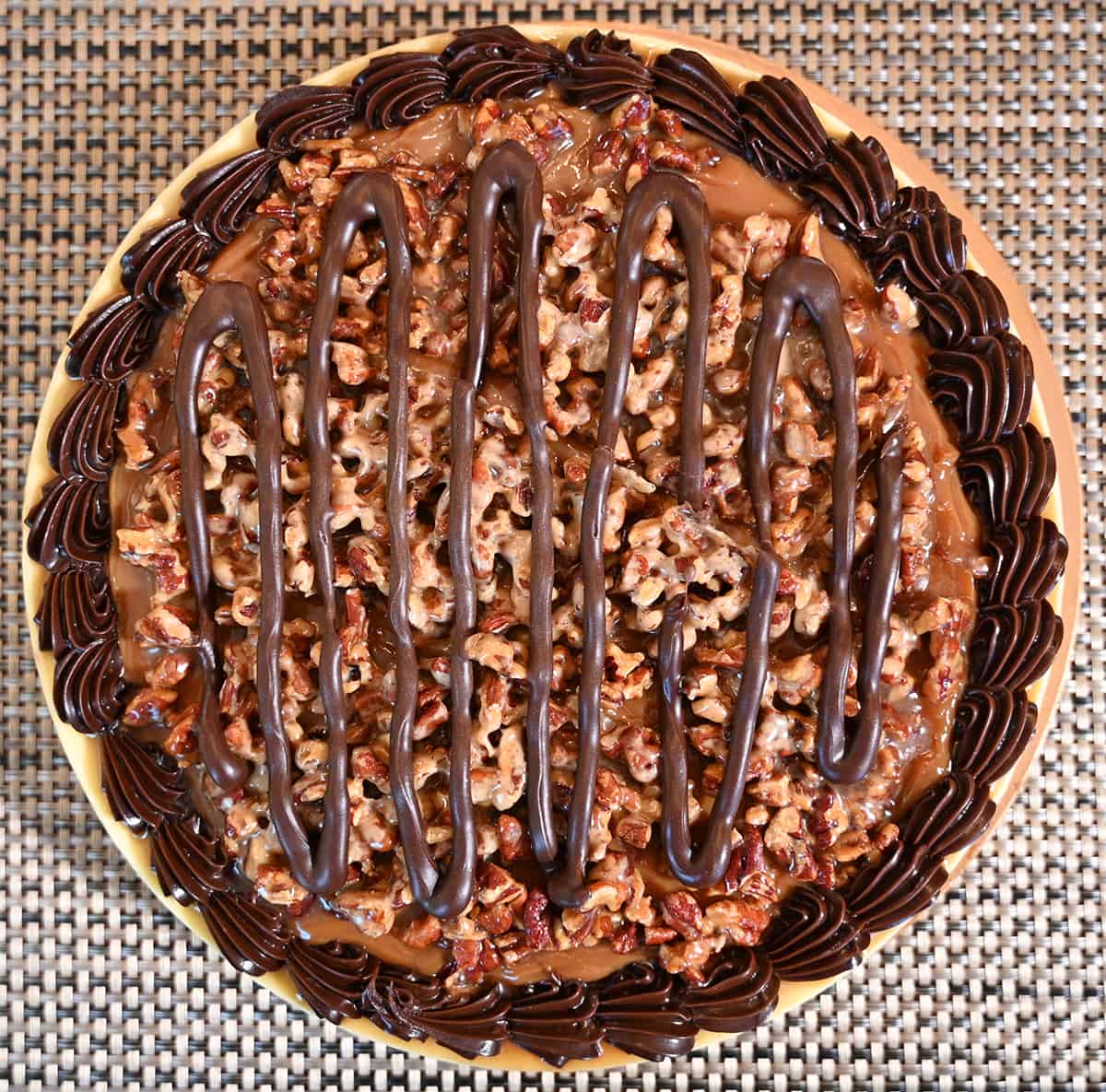 Top down close up image of the cheesecake opened with the lid off, not yet sliced.