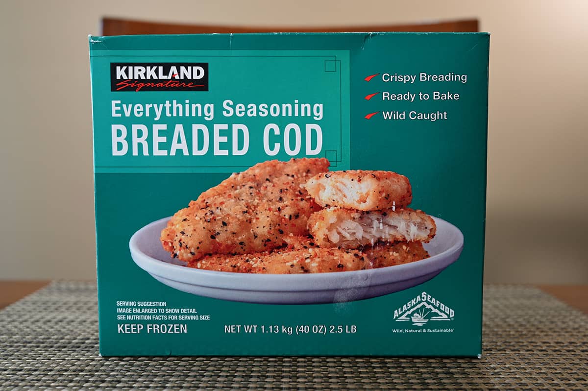 Image of the Costco Everything Seasoning Breaded Cod box sitting on a table, unopened.