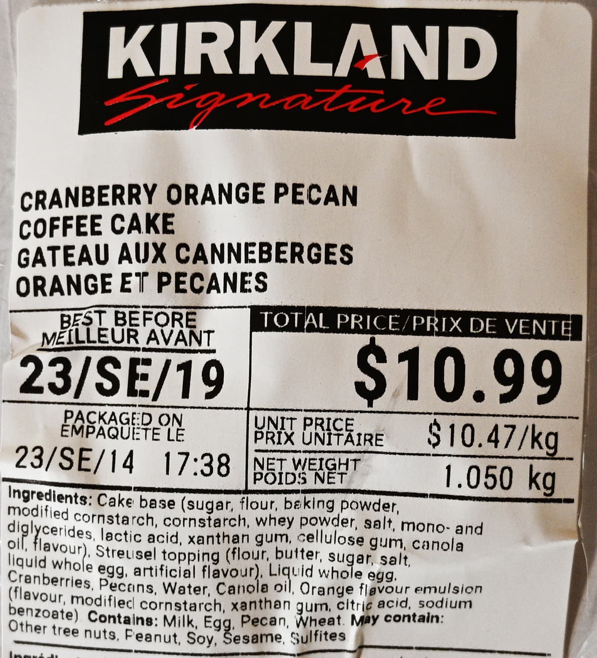 Closeup image of the front label of the coffee cake showing price, best before date and ingredients.