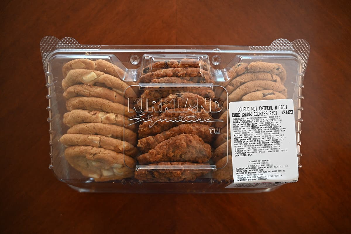 Top down image of the Costco Kirkland Signature Double Nut Oatmeal Raisin Choc Chunk Cookies pack unopened sitting on a table.