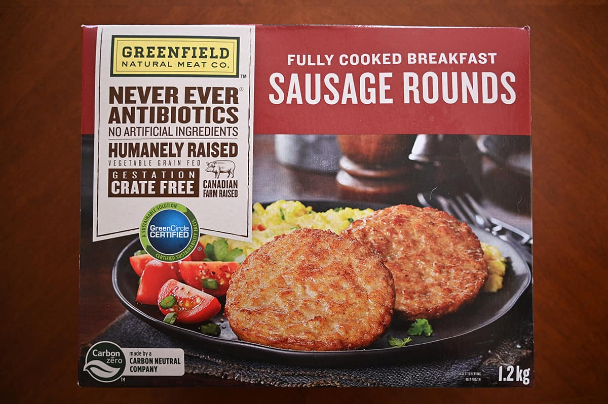Image of the Costco Greenfield Natural Meat Co. Fully Cooked Breakfast Sausage Rounds box sitting on a table.