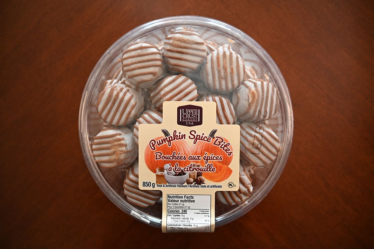 Top down image of the Costco Upper Crust Bakery Pumpkin Spice Bites package sitting on a table unopened.