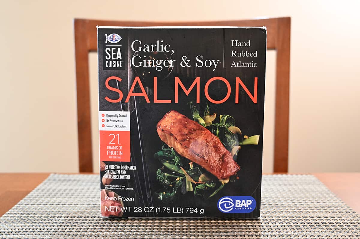 Side view image of the Costco High Liner Sea Cuisine Garlic, Ginger & Soy Salmon box sitting on a table.