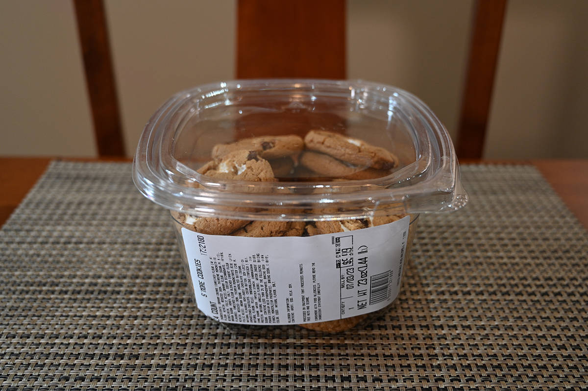 Image of the Costco Kirkland Signature S'more Cookies container sitting on a table unopened.