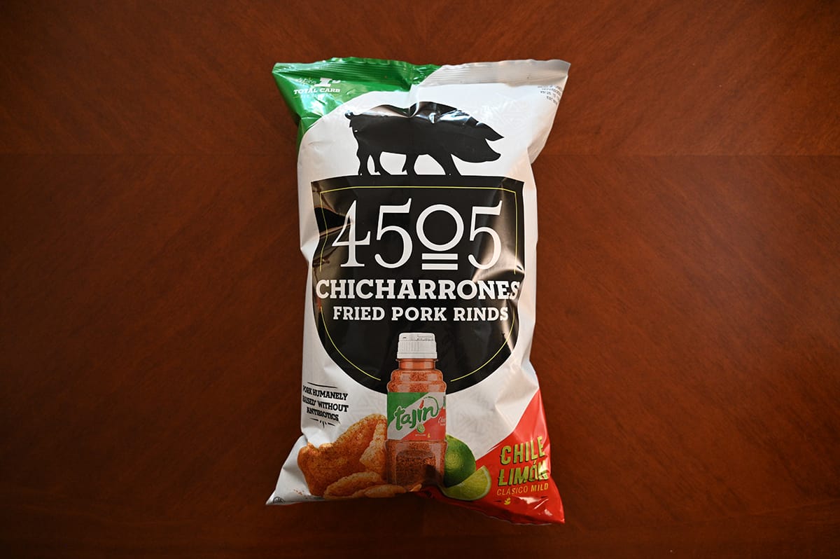 Image of the Costco 4505 Chicharrones Fried Pork Rinds bag sitting on a table unopened.