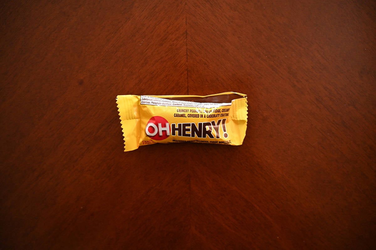 Top down image of an unopened Oh Henry! bar sitting on a table.