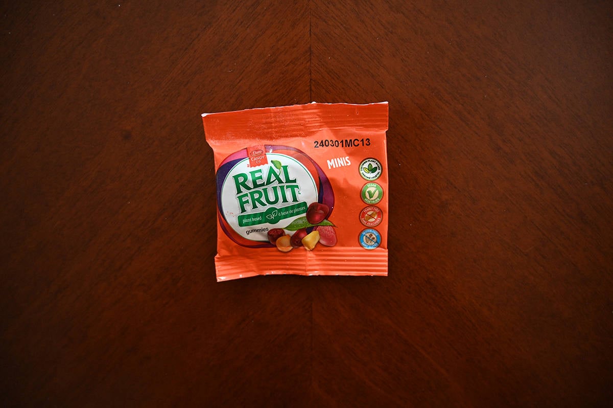 Top down image of an unopened package of Real Fruit Gummies sitting on a table.