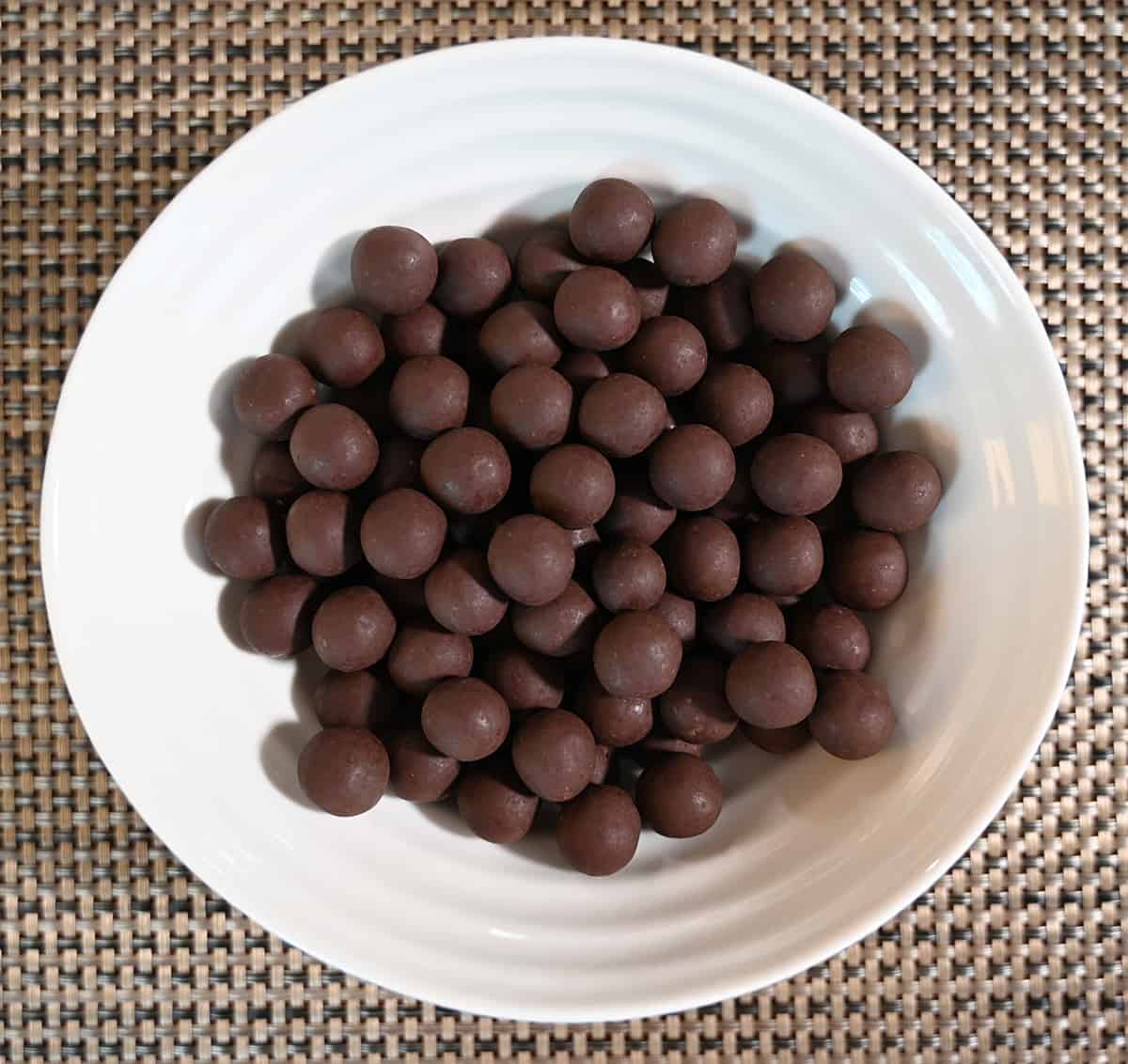 Top down image of a bowl full of thin mints bites.