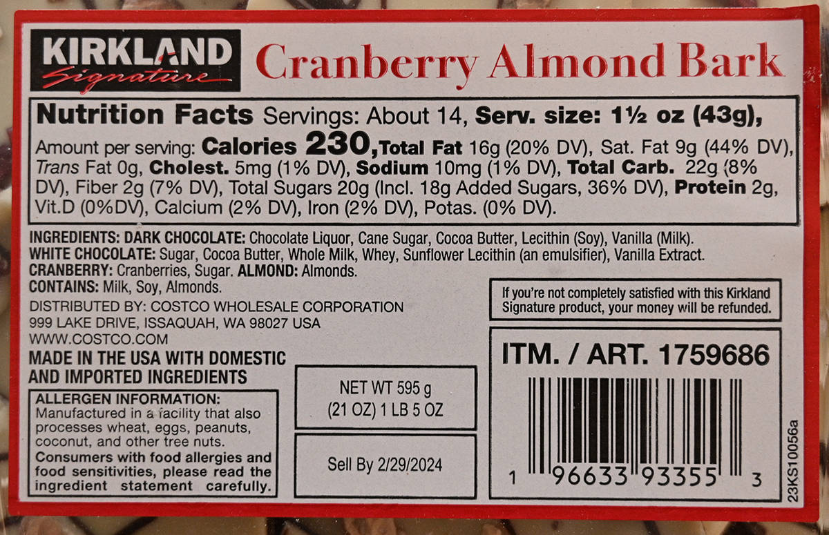 Closrup image of the front label of the cranberry almond bark showing nutrition facts, ingredients and sell by date.