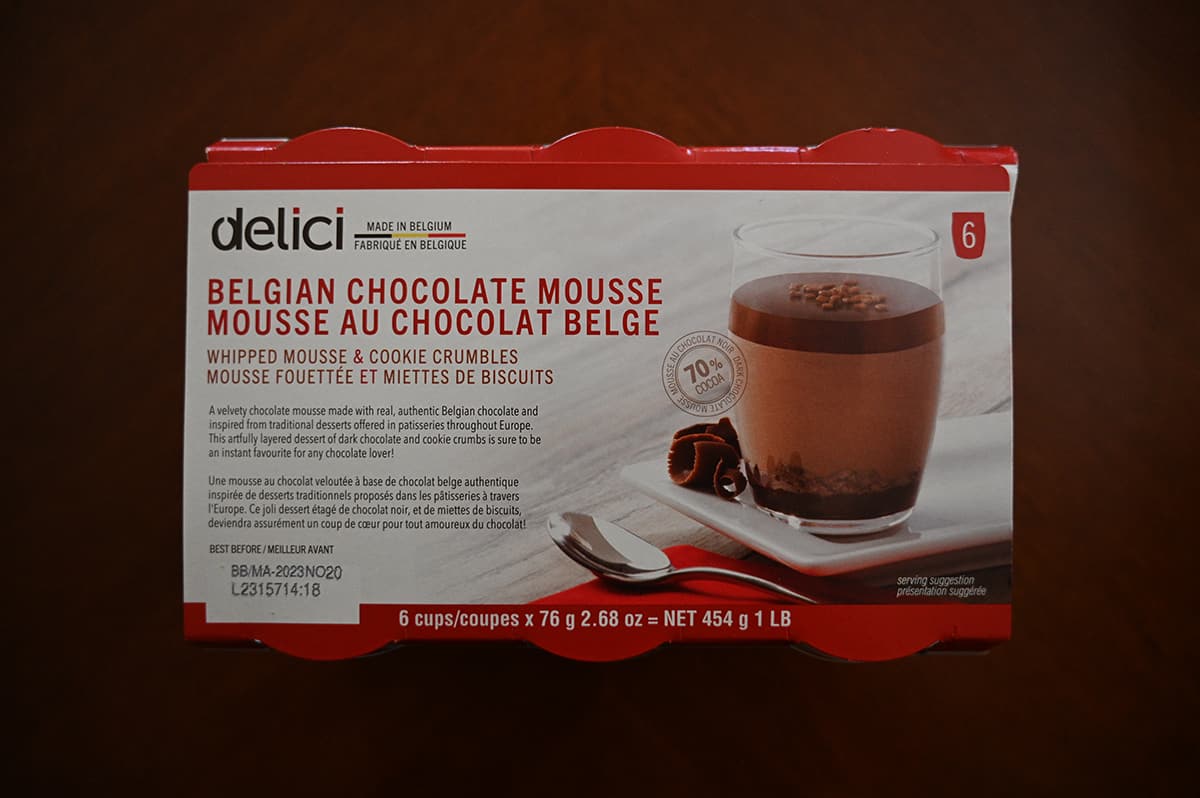 Top down image of the Costco Delici Belgian Chocolate Mousse pack sitting on a table unopened.