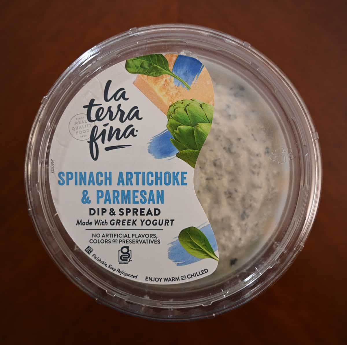 Top down image of the dip container lid showing that it has no artificial flavors, colors or preservatives.