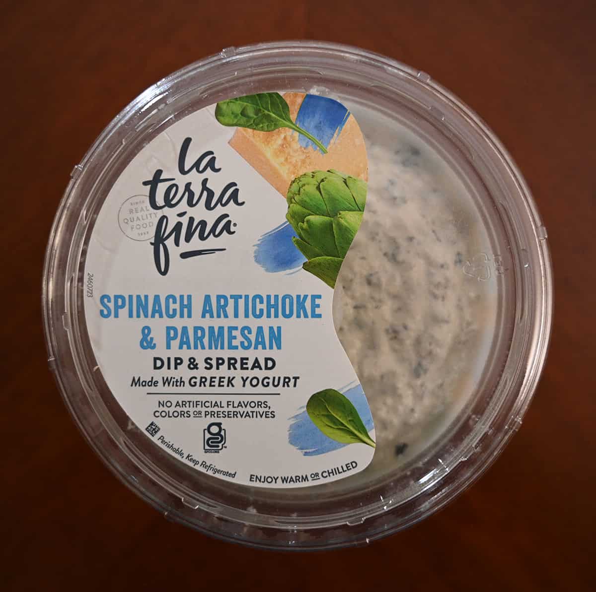 Top down image of the dip container lid showing that it has no artificial flavors, colors or preservatives.