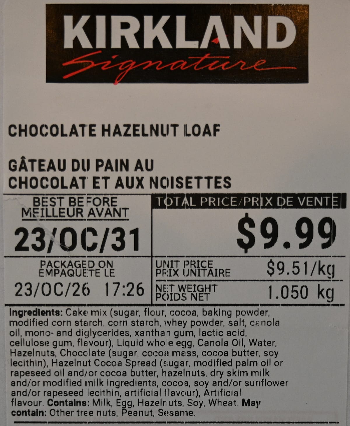Closeup image of the front label of the loaf showing ingredients, best before date and cost.
