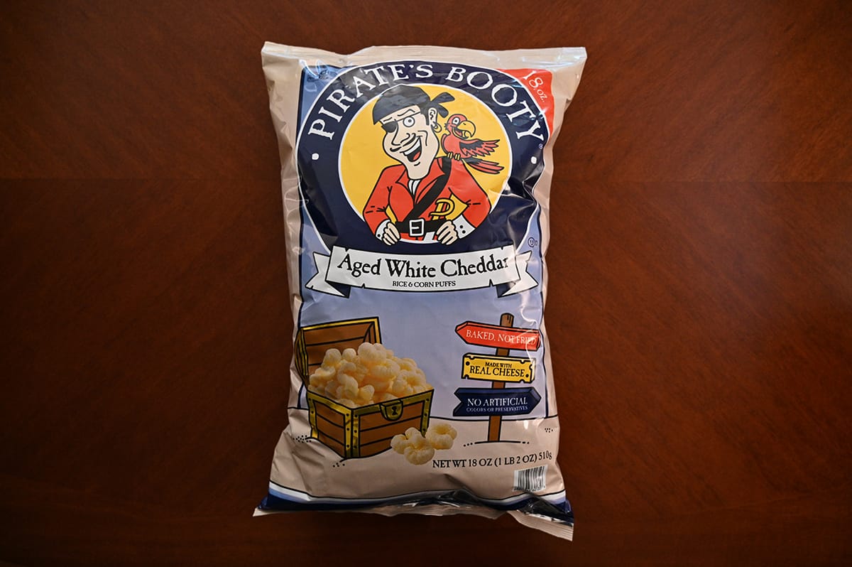 Top down image of Costco Pirate's Booty Rice & Corn Puffs bag sitting on a table.