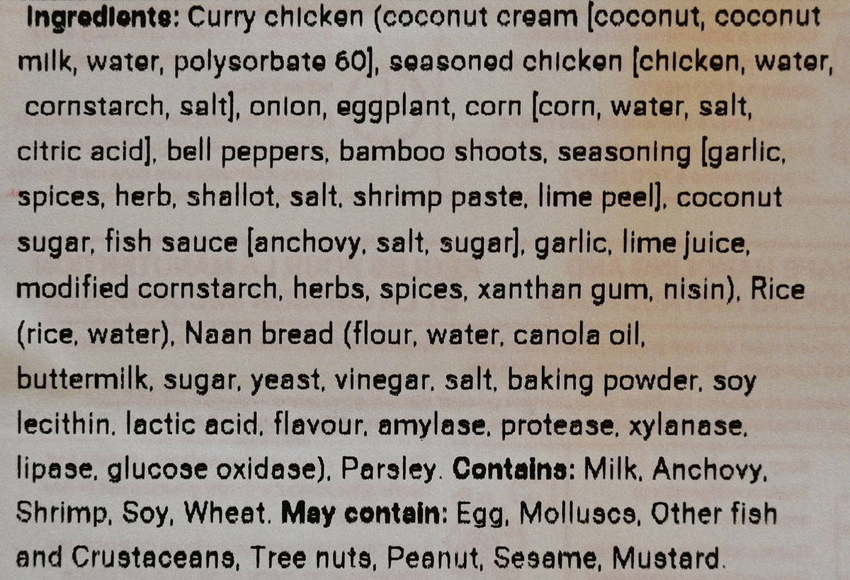 Image of the ingredients list for the red thai chicken curry from the front label.