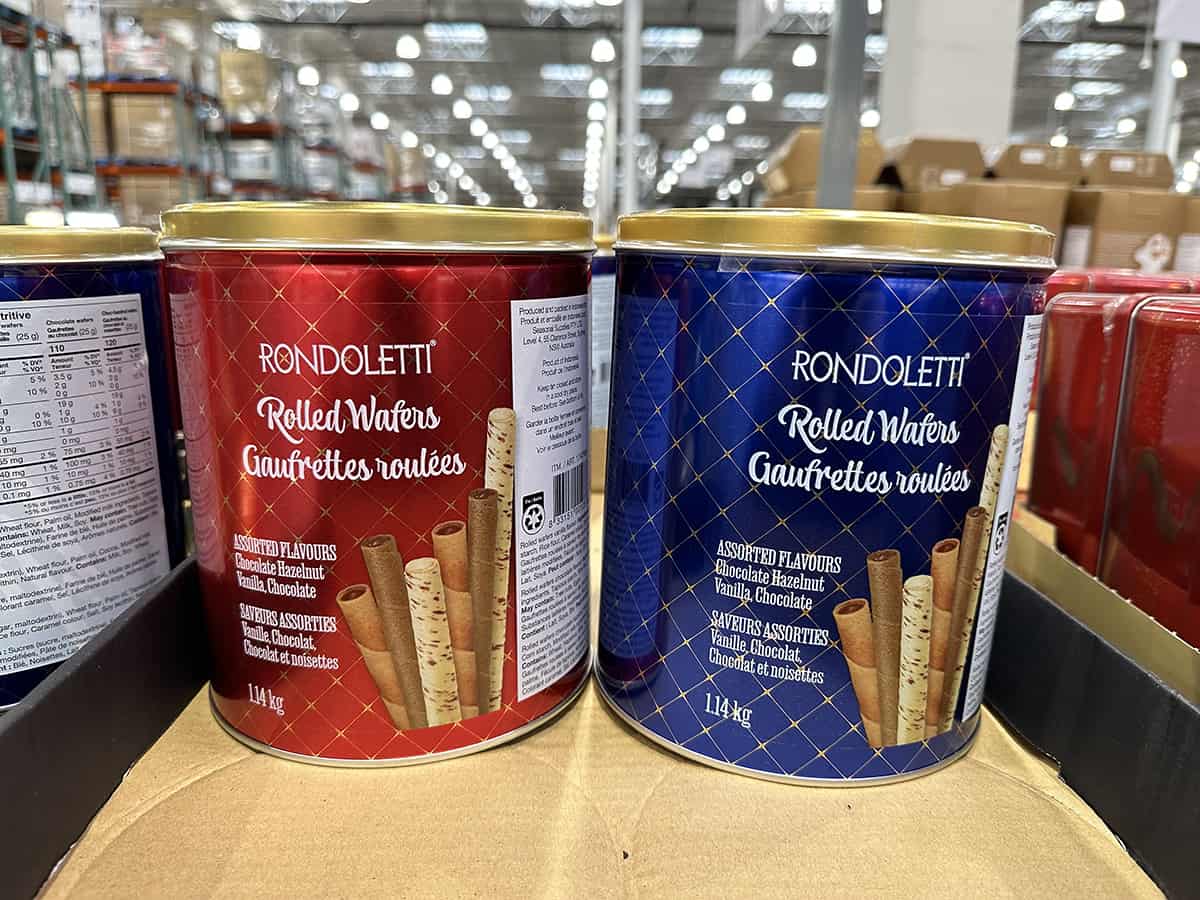 Image of one red Rondoletti tin beside a blue Rondoletti tin at Costco on the shelf.