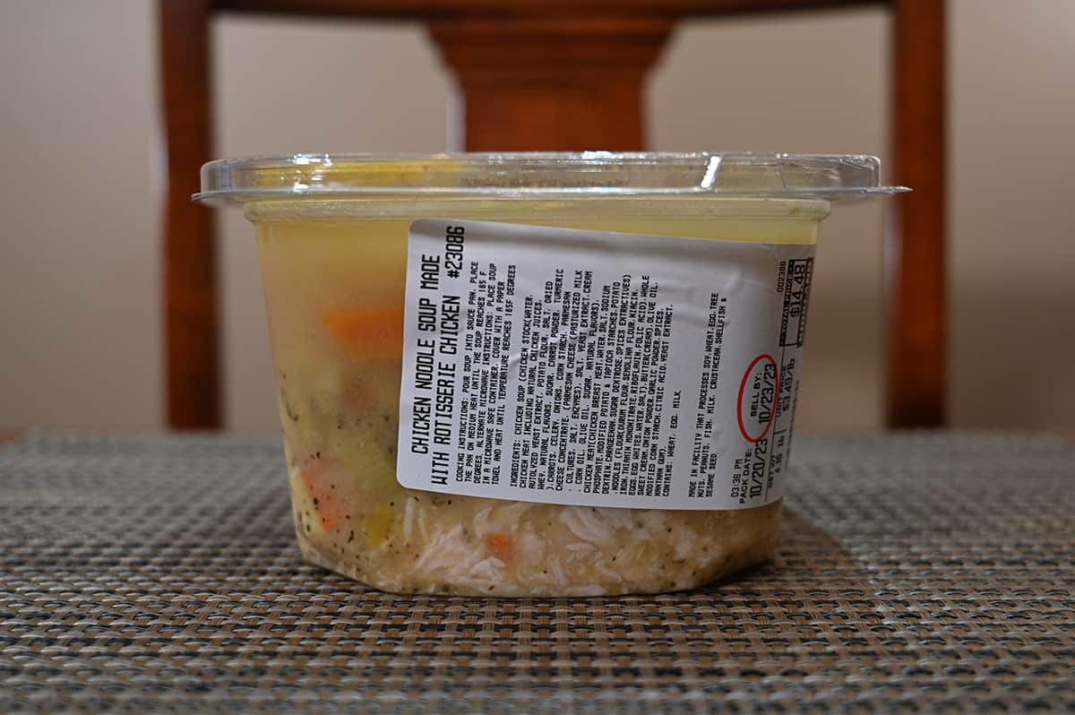 Image of the Costco Kirkland Signature Chicken Noodle Soup container sitting on a table.