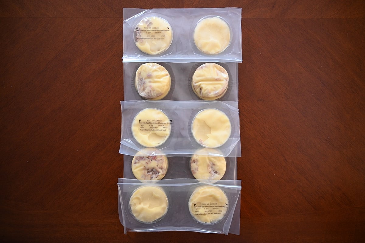 Top down image of the packaged egg bites on a table. The egg bites come vacuum sealed in packs of two.