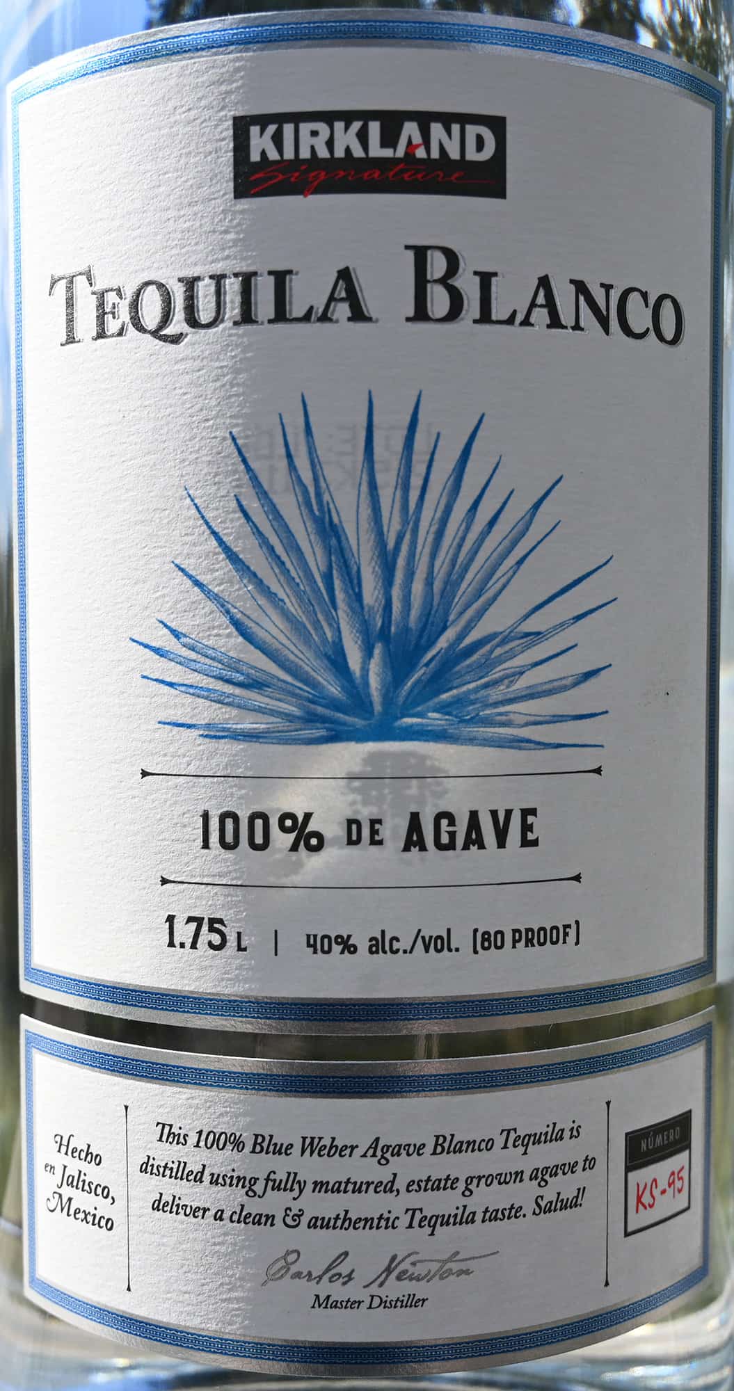 Closeup image of the front label on the blanco tequila showing alcohol percentage and product description.