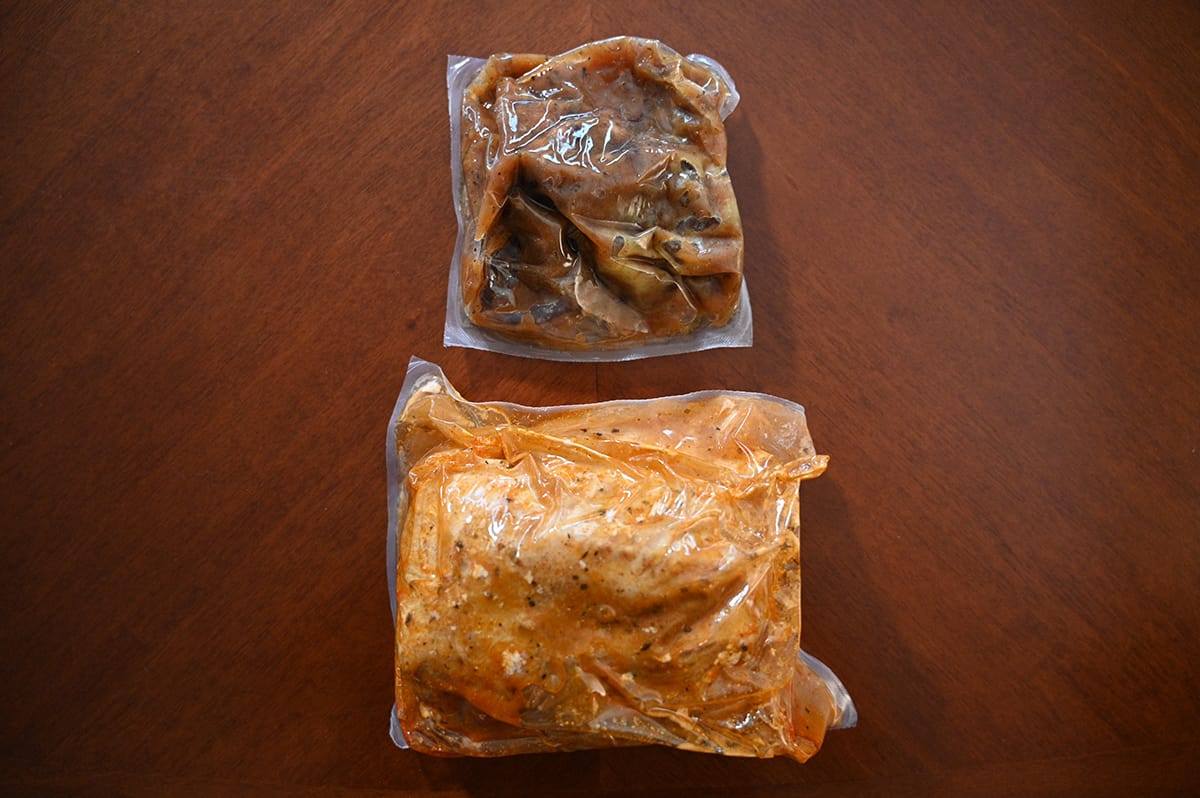 Top down image of the vacuum sealed chutney and vacuum sealed turkey breast unopened sitting on a table.