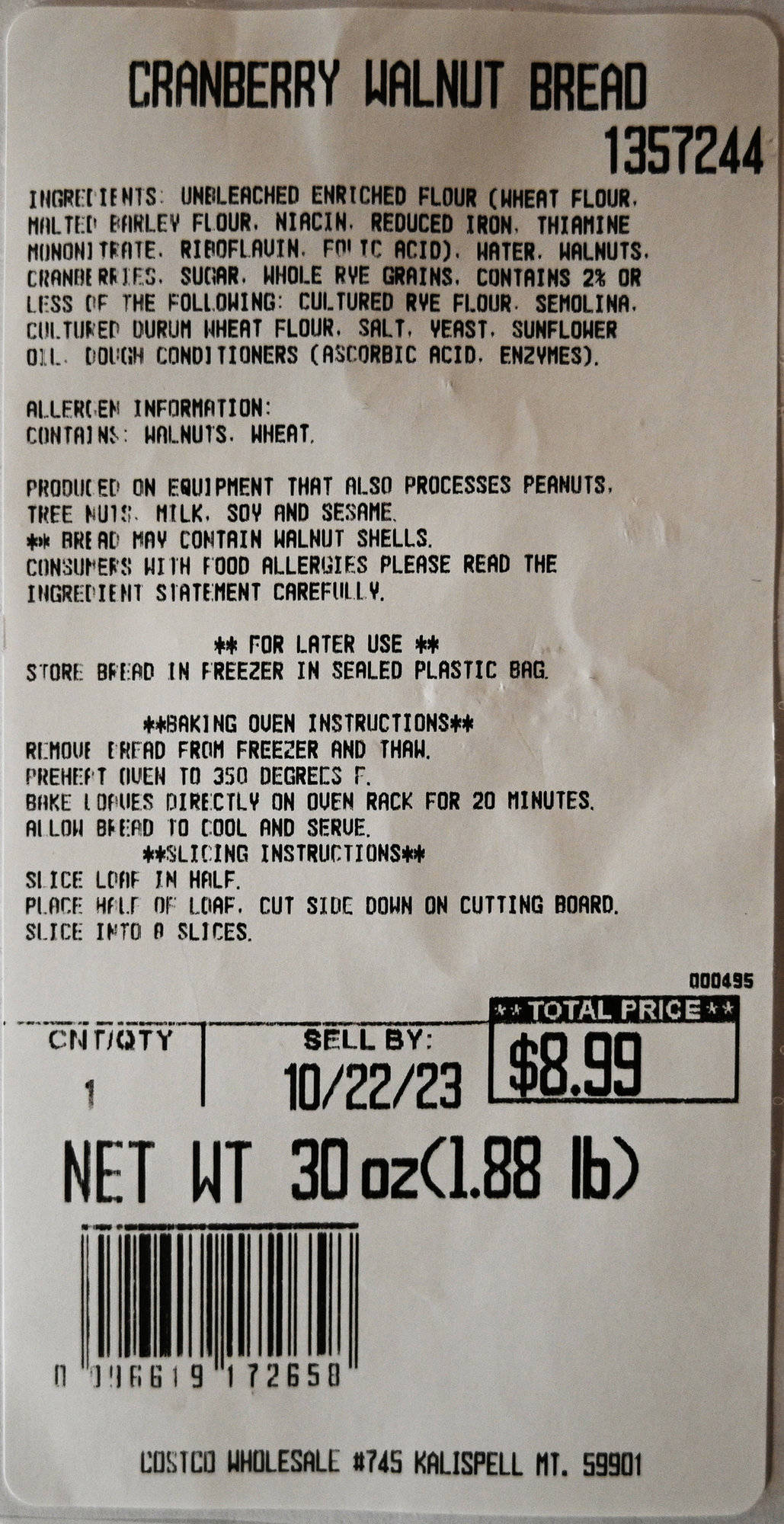 Closeup image of the front label on the cranberry walnut loaf showing ingredients, sell by date and cost.