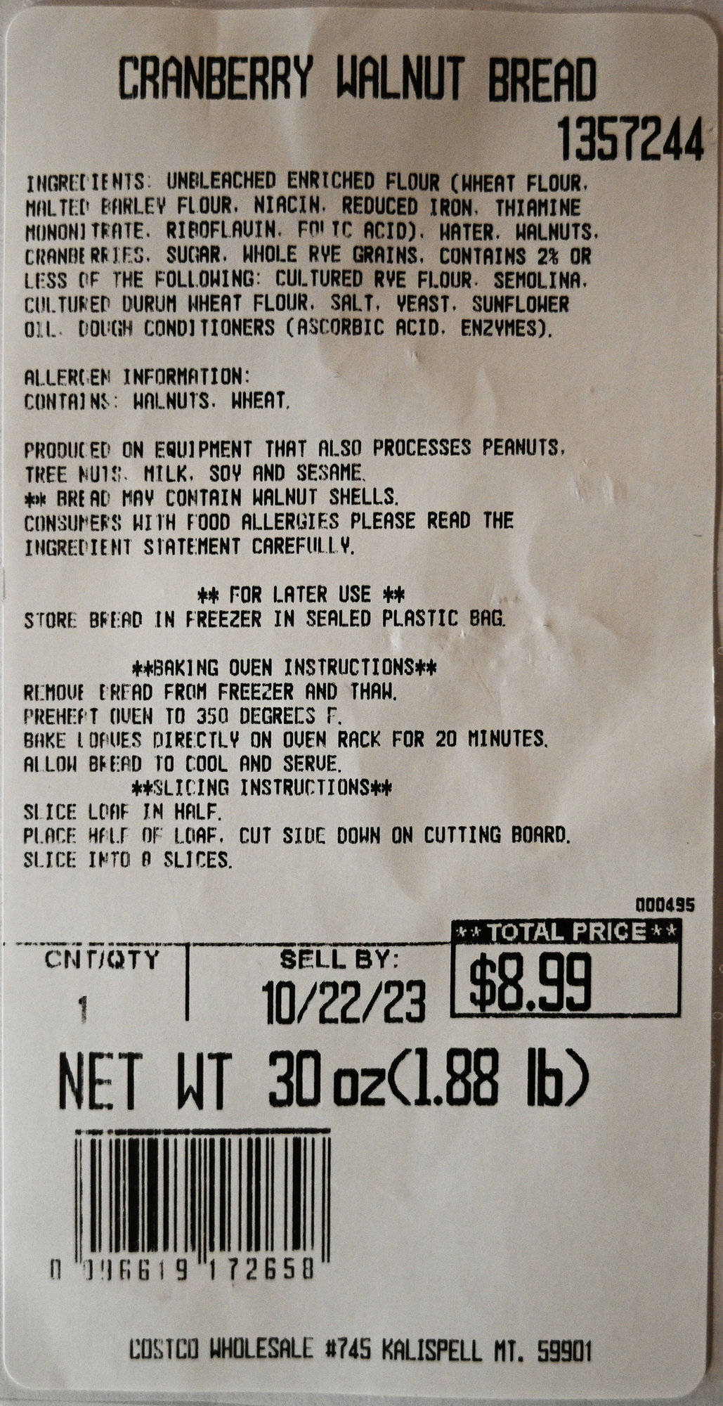 Closeup image of the front label on the cranberry walnut loaf showing ingredients, sell by date and cost.