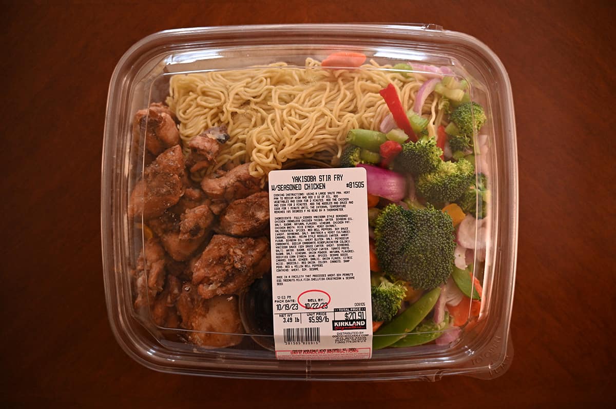 Top down image of the Costco Kirkland Signature Yakisoba Stir Fry sitting on a  table unopened. 