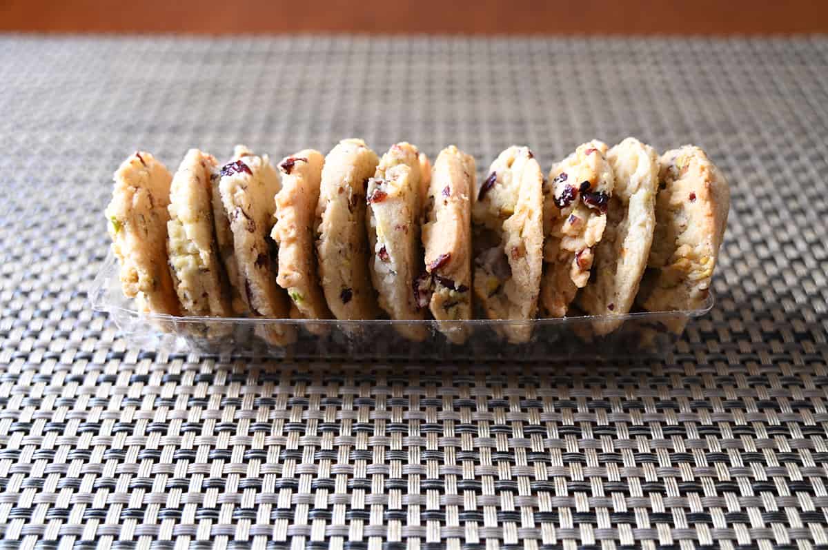 Image of one tube of cookies opened sitting on a table.