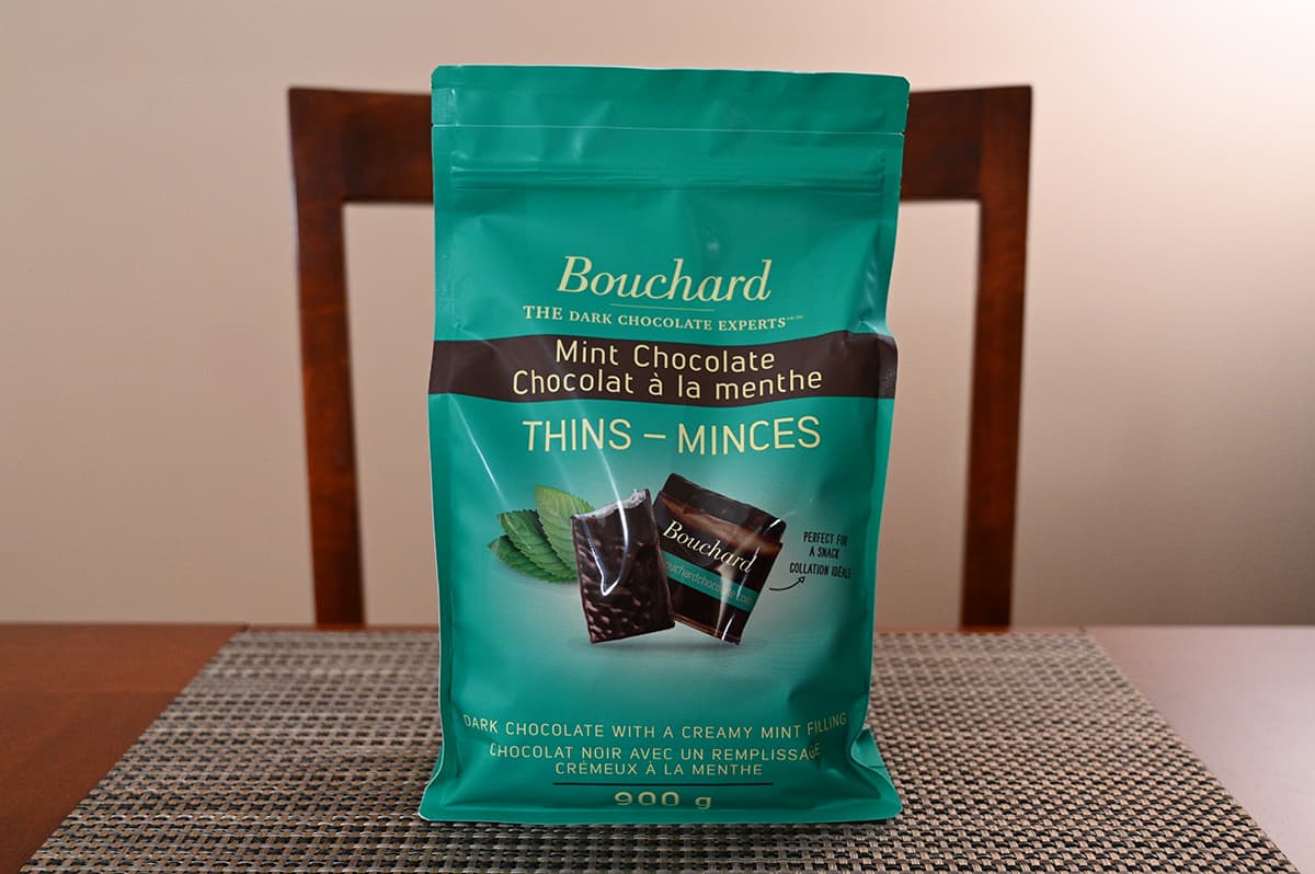 Image of the Costco Bouchard Mint Chocolate Thins bag sitting on a table unopened. 