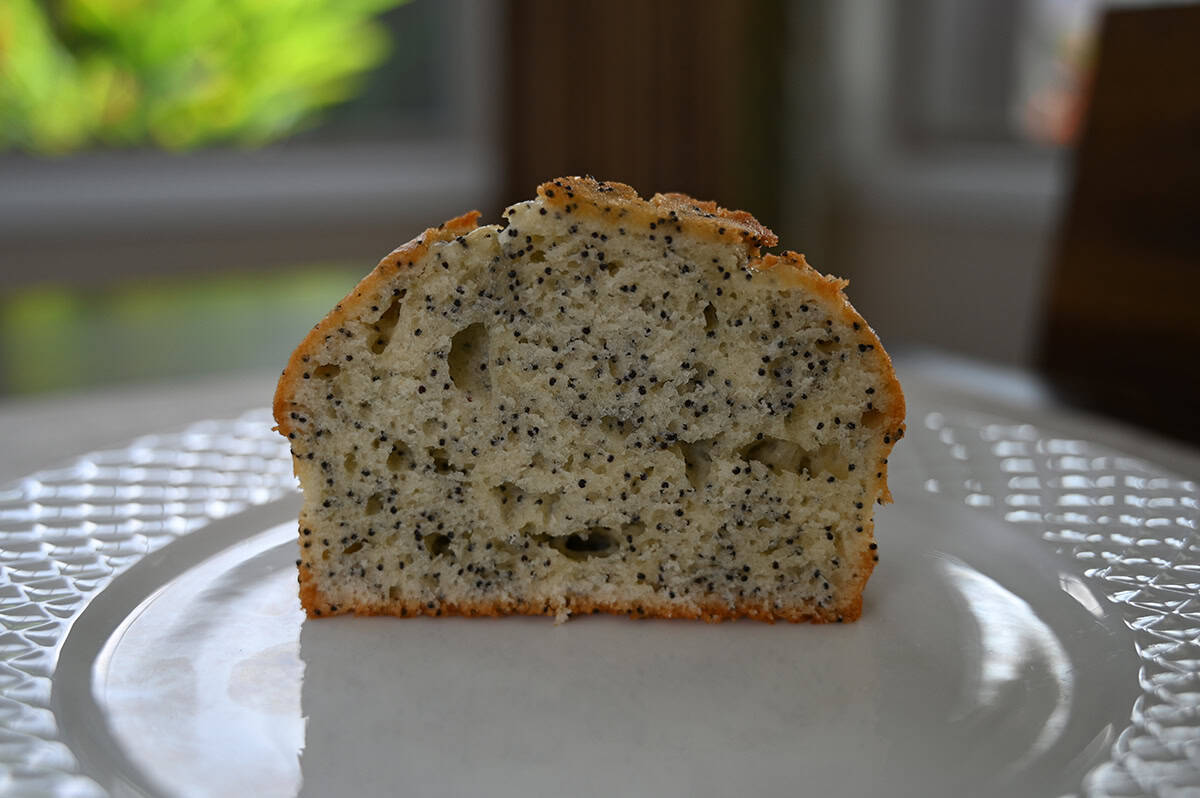 Almond poppy muffin cut in half so you can see the middle.