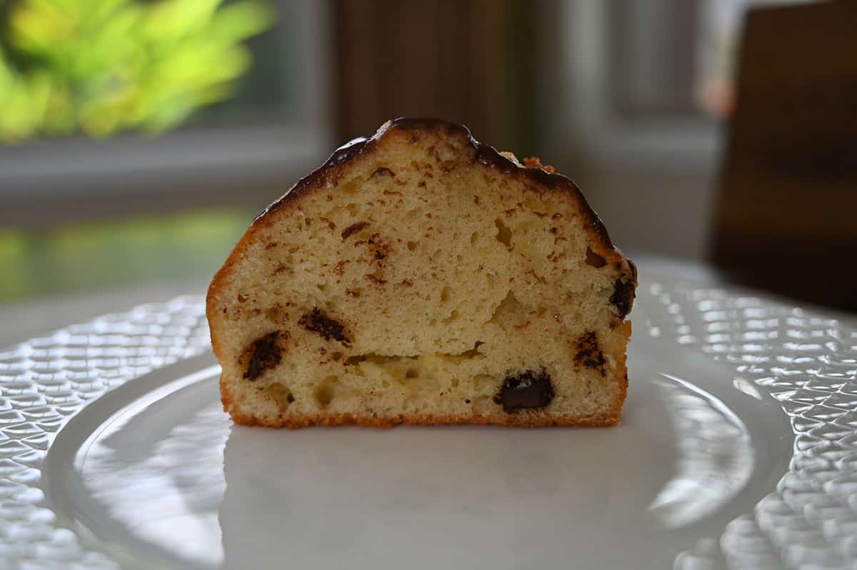 Vanilla chocolate chunk muffin cut in half so you can see the middle.