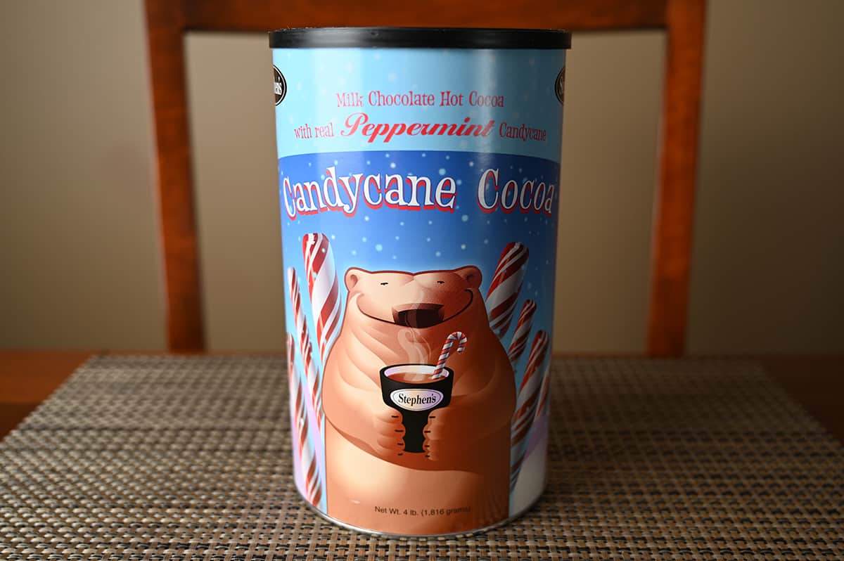 Image of the candycane hot cocoa standing alone sitting on a table unopened.