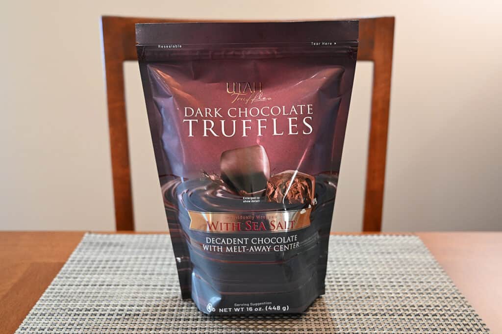 Image of the Utah Truffles dark chocolate with sea salt bag sitting on a table unopened.