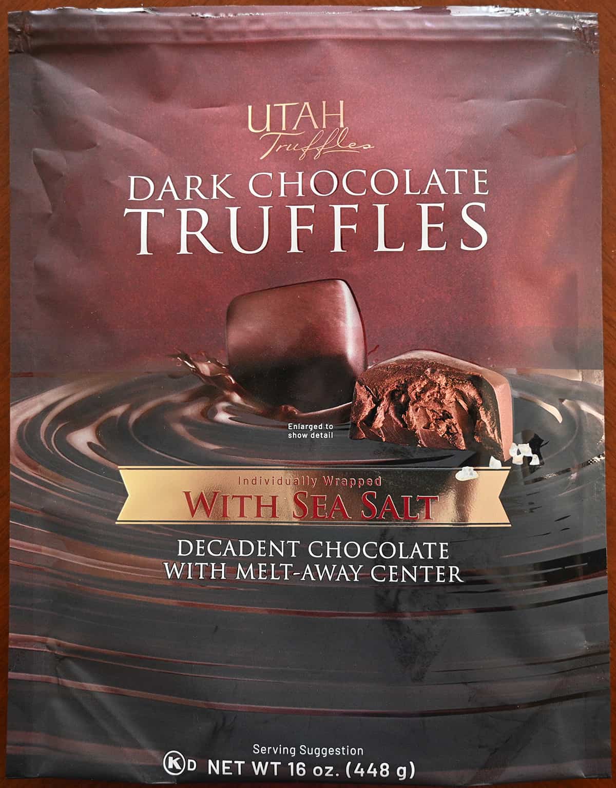 Closeup image of the front of the bag of dark chocolate with sea salt truffles showing size of the bag and product description.