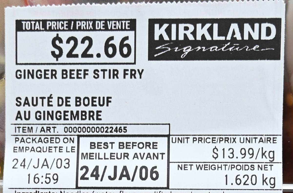 Closeup image of the front label on the ginger beef stir-fry showing best before date and cost.